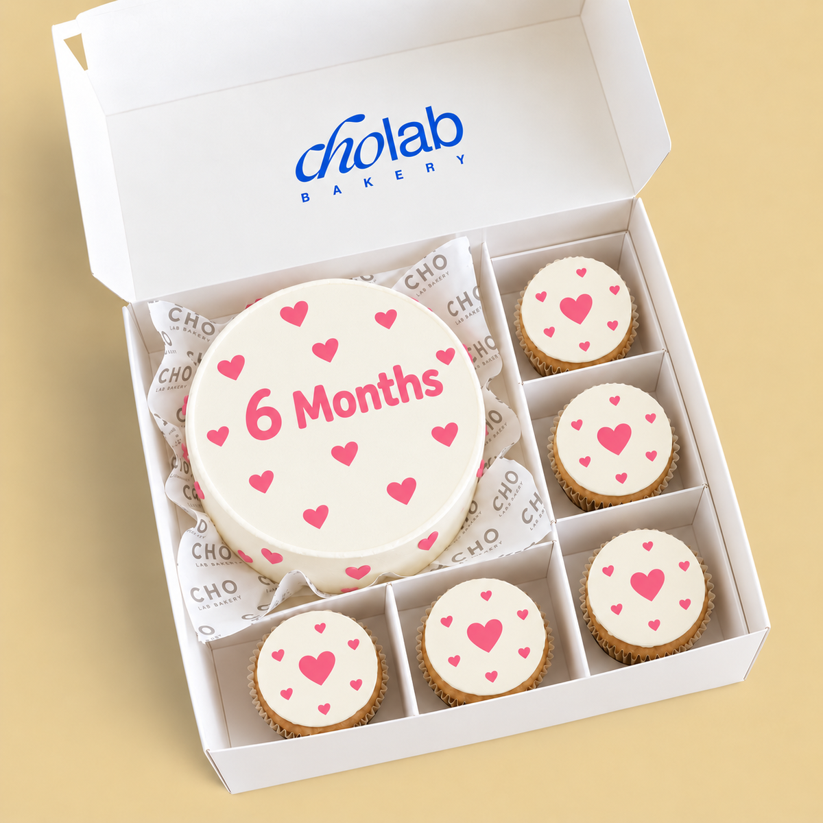 Six Months — Edible Print — one mini cake and five cupcakes with edible printed artwork
