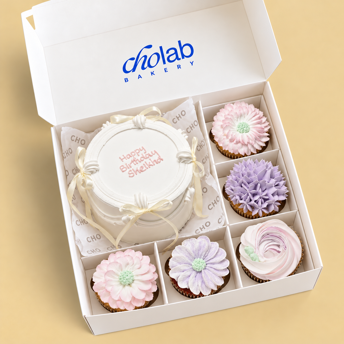 Pastel Wishes — one mini cake and five matching cupcakes in CHO packaging