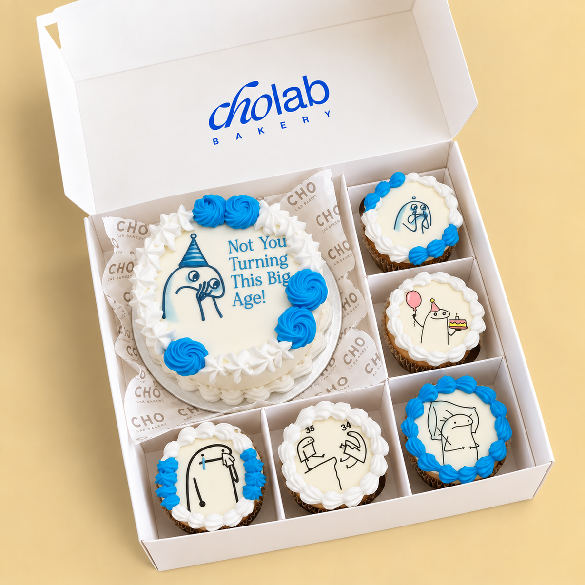 This Big Age — one mini cake and five matching cupcakes in CHO packaging