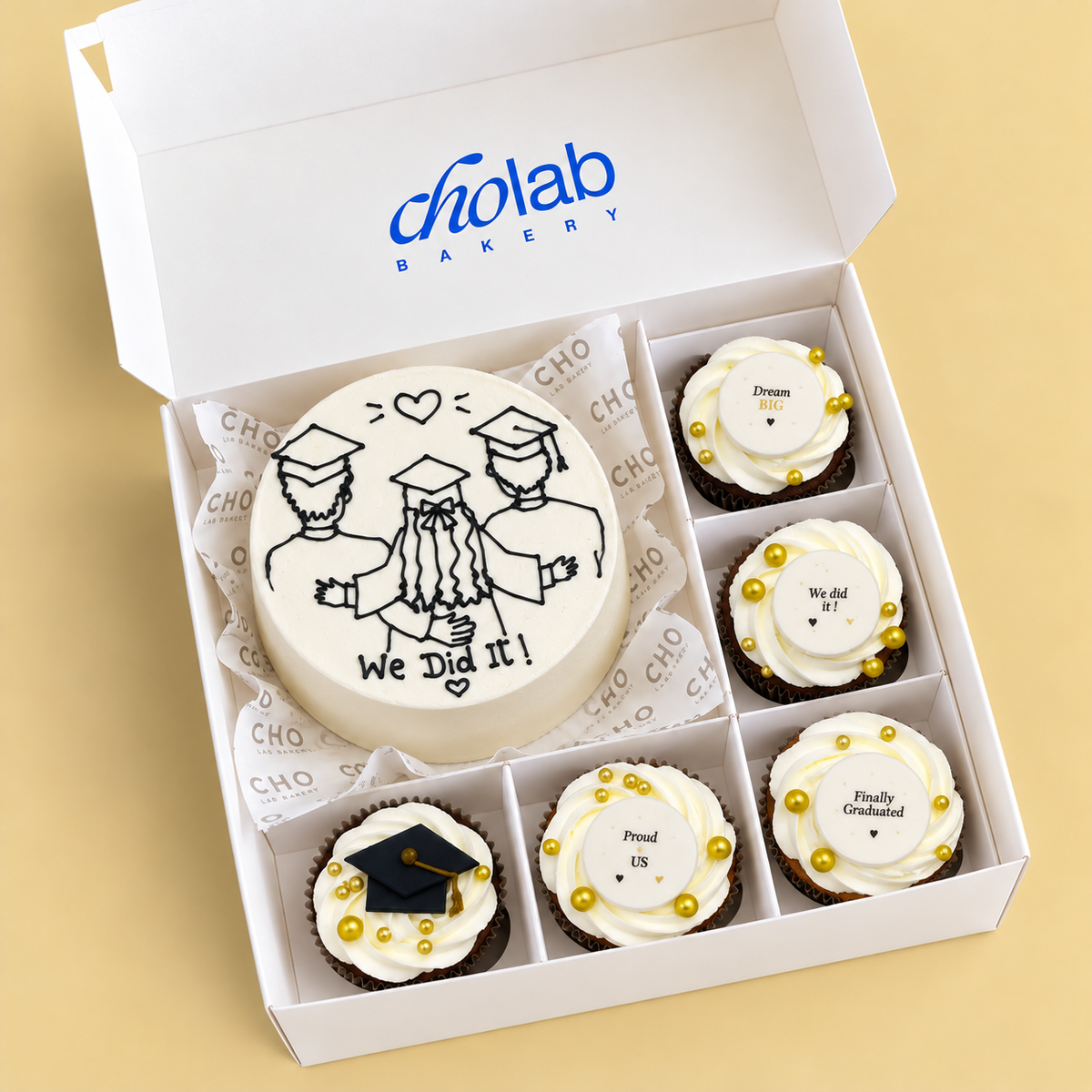 We Did It — one mini cake and five matching cupcakes in CHO packaging